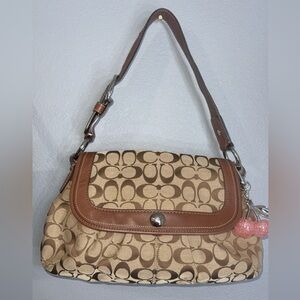 Coach Soho pleated signature canvas shoulder bag with brown leather trim.